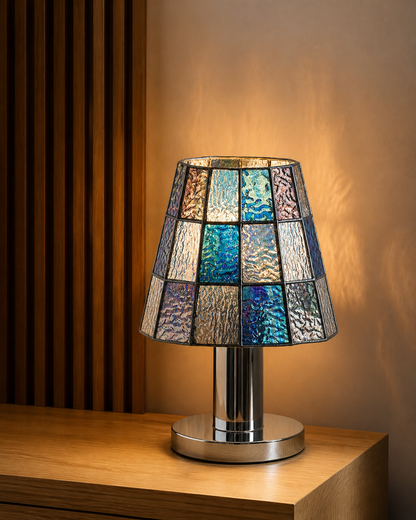 KALI designer table lamp casting warm ambient light over a coffee table — DecoHarmonie
