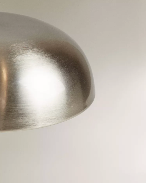 MALMO cordless designer table lamp casting warm ambient light over a coffee table — DecoHarmonie
