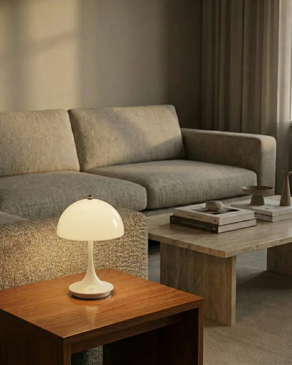MIDO cordless designer table lamp softening the light in a contemporary lounge — DecoHarmonie