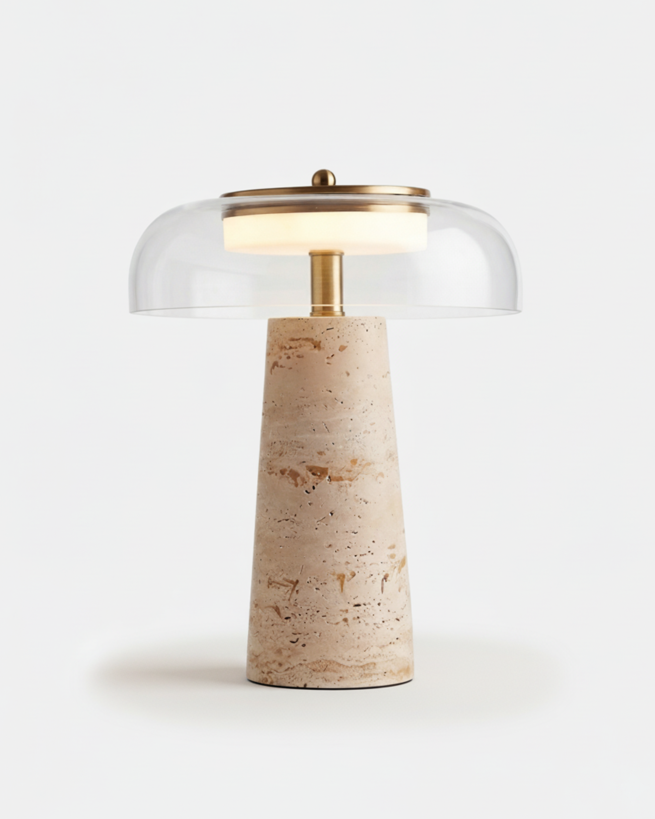 ZOA designer table lamp with tapered travertine base, clear glass dome shade and brass detail | DecoHarmonie