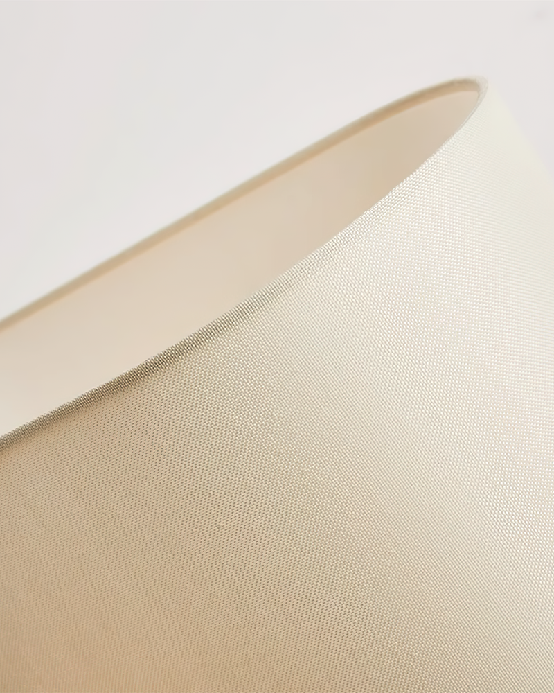 KALLE designer table lamp in a warm, considered living room setting — DecoHarmonie