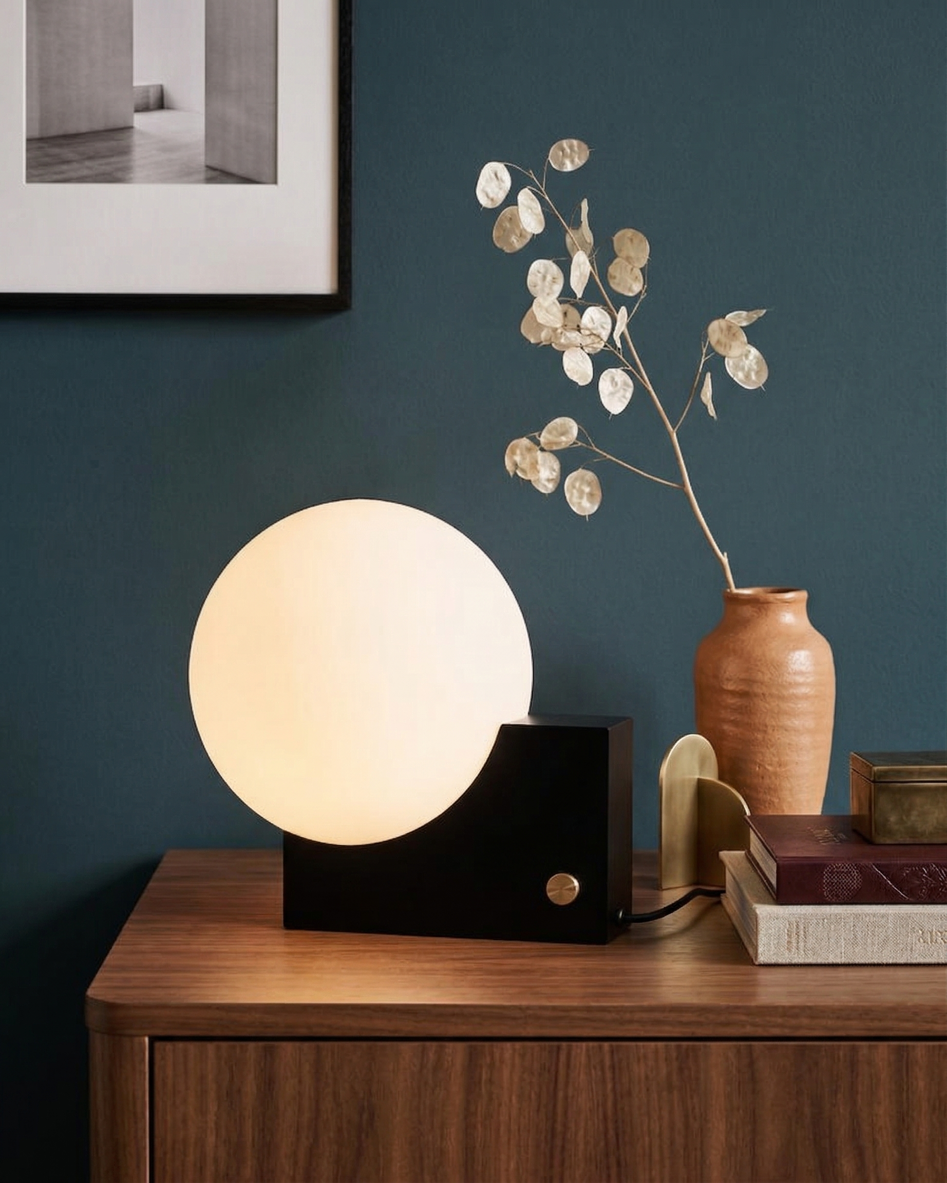 TERO designer table lamp in a warm, considered living room setting — DecoHarmonie