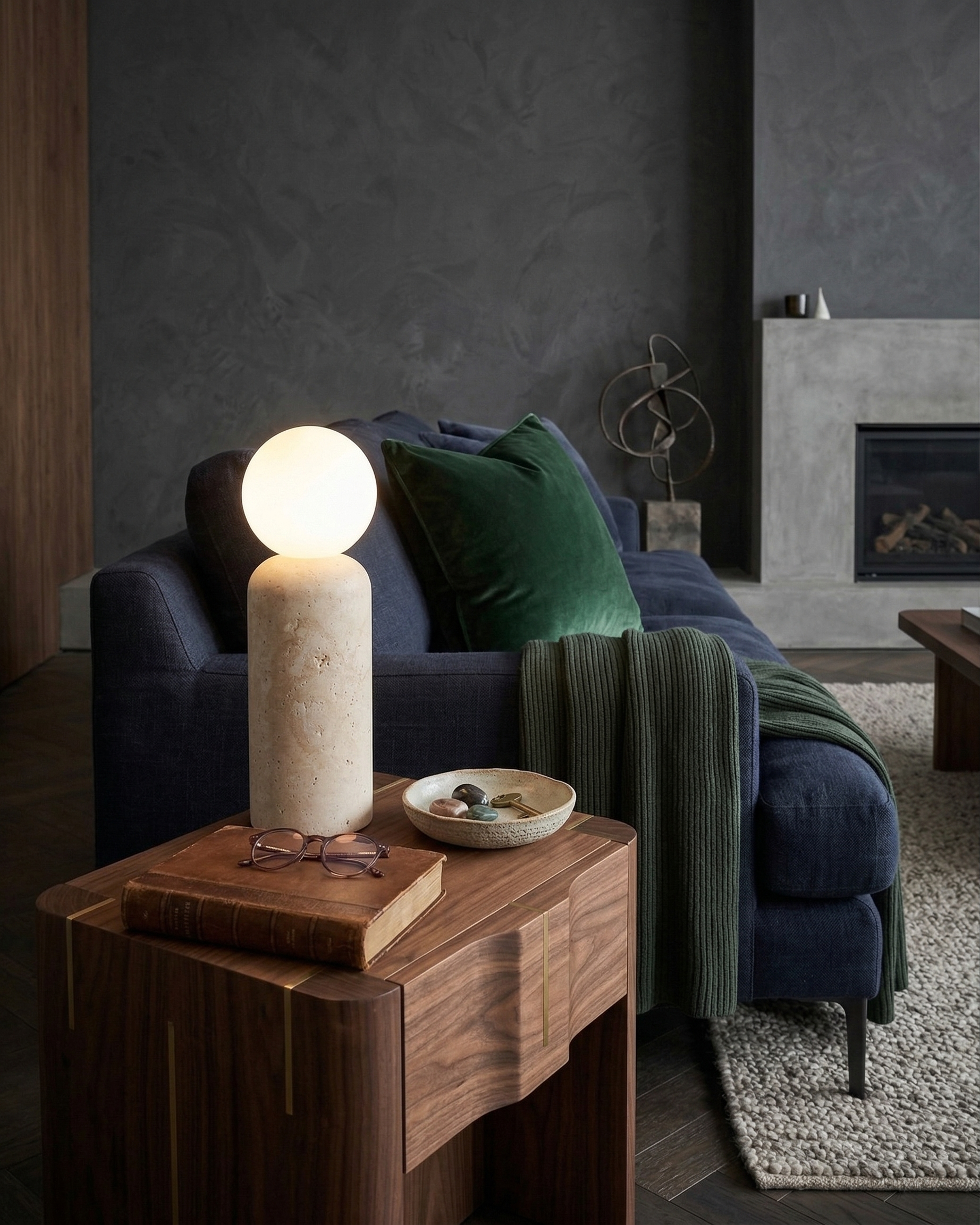 ZIRO designer table lamp casting warm ambient light over a coffee table — DecoHarmonie
