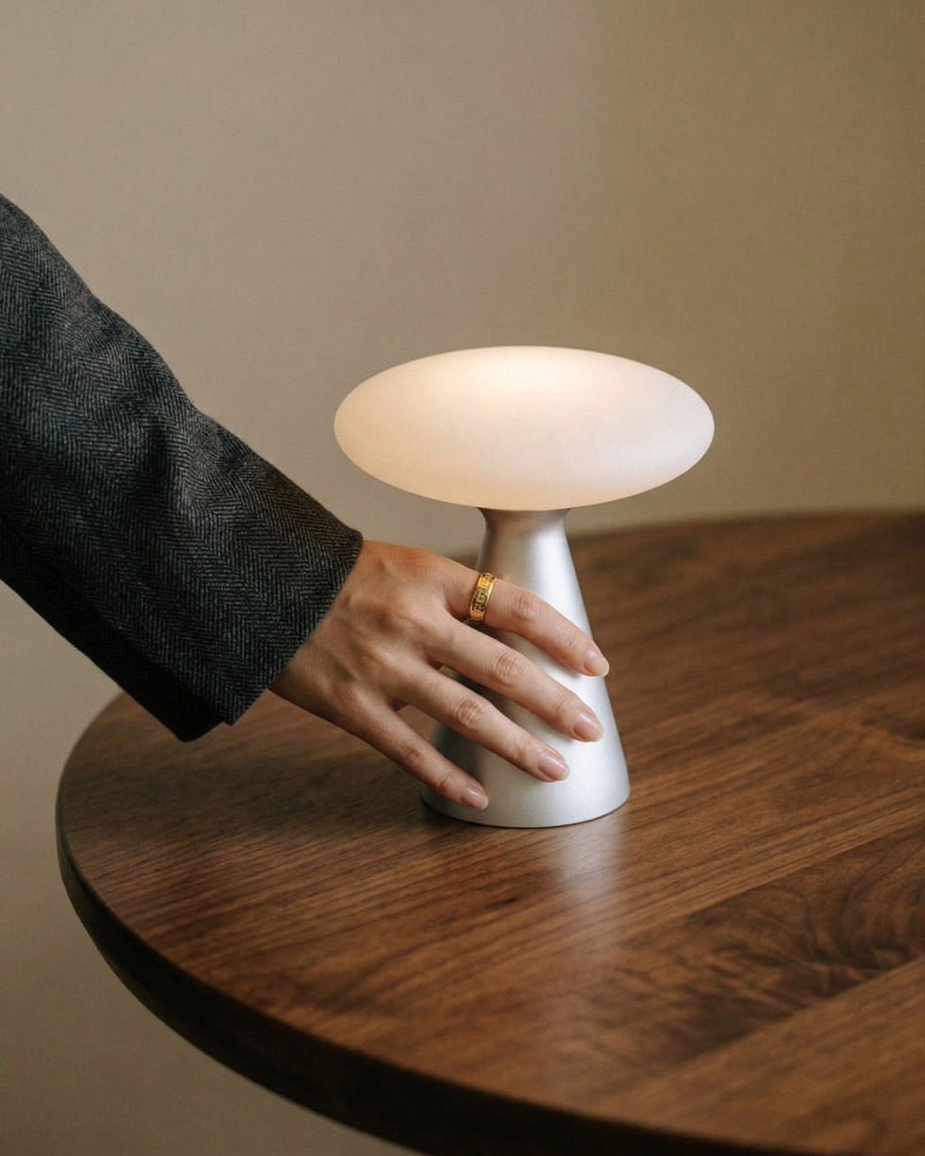 PRISM designer table lamp softening the light in a contemporary lounge — DecoHarmonie