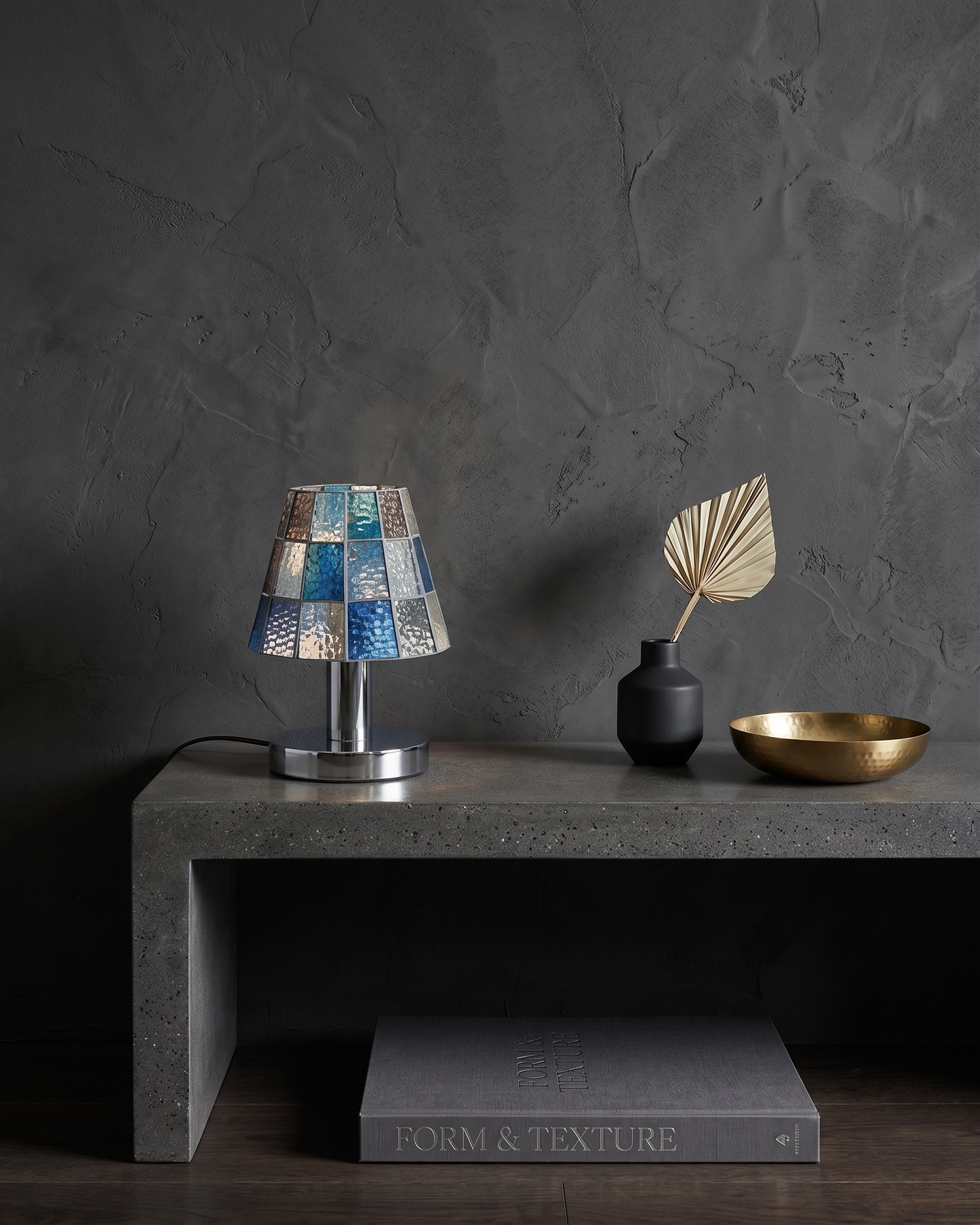 KALI designer table lamp shown on a bedside table in a modern bedroom — DecoHarmonie