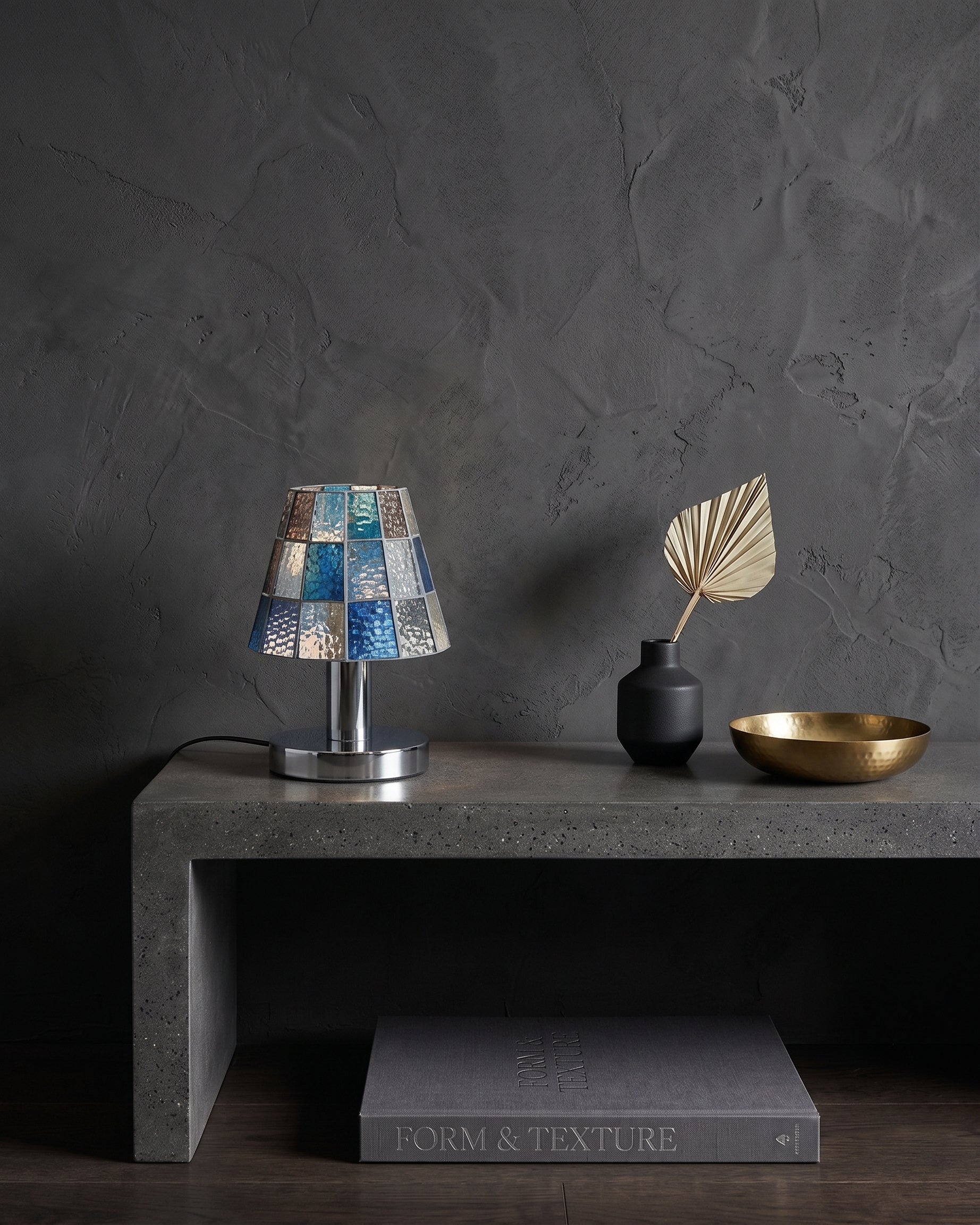 KALI designer table lamp shown on a bedside table in a modern bedroom — DecoHarmonie