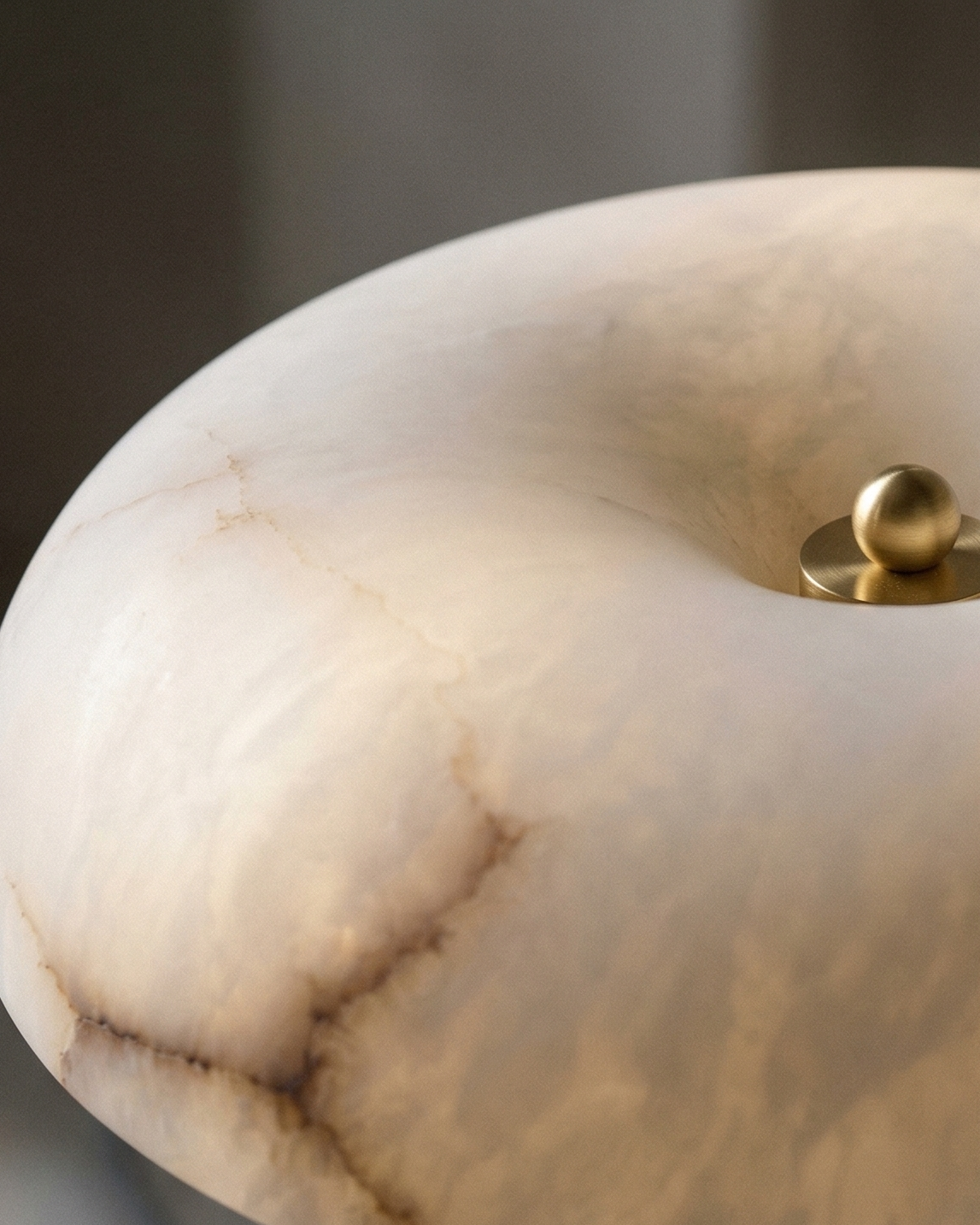 IZO designer table lamp casting warm ambient light over a coffee table — DecoHarmonie