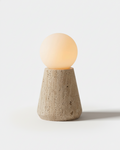ZIRO table lamp with opal glass globe on tapered travertine cone base, designer cordless wabi-sabi style | DecoHarmonie