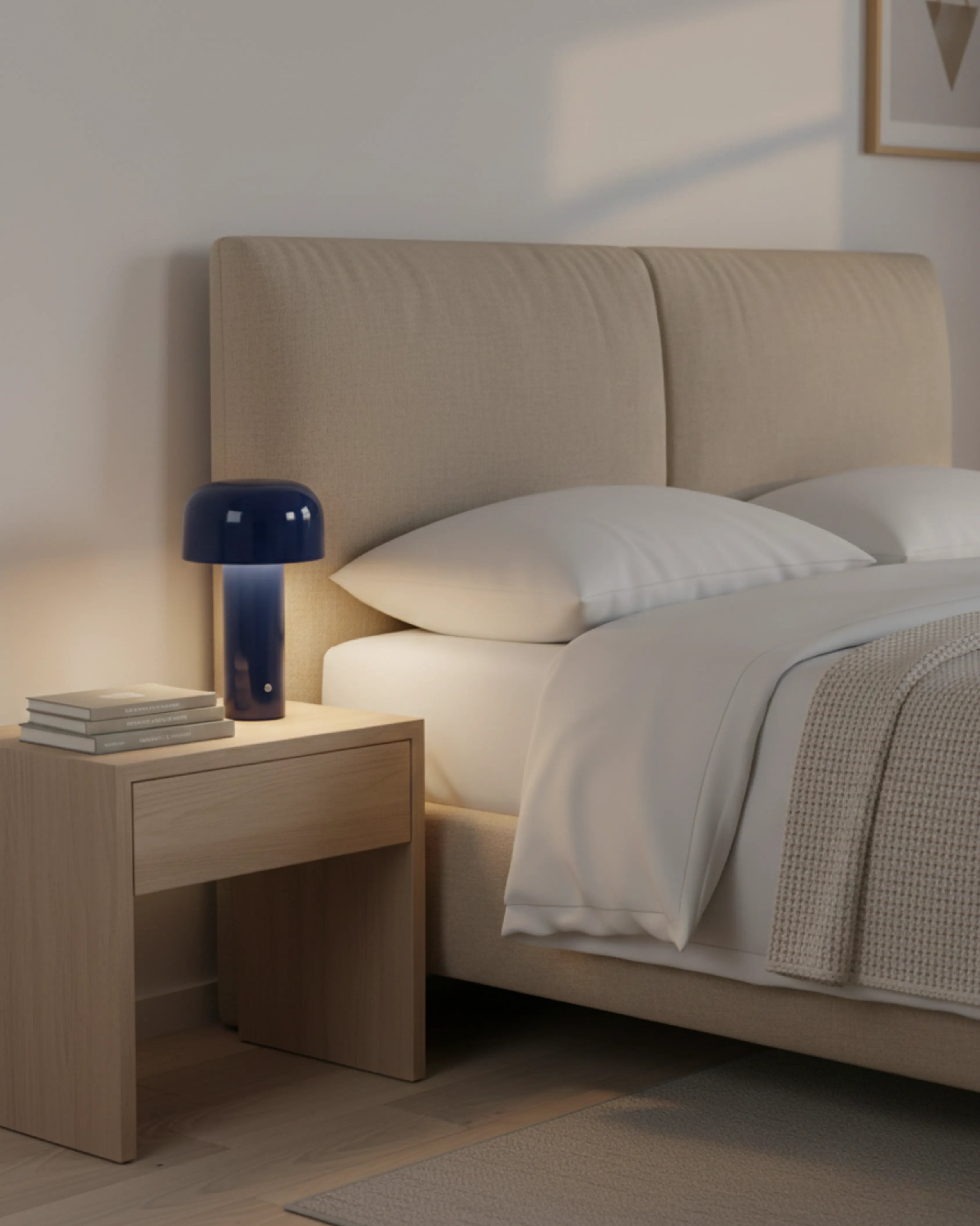 LAKO cordless designer table lamp softening the light in a contemporary lounge — DecoHarmonie