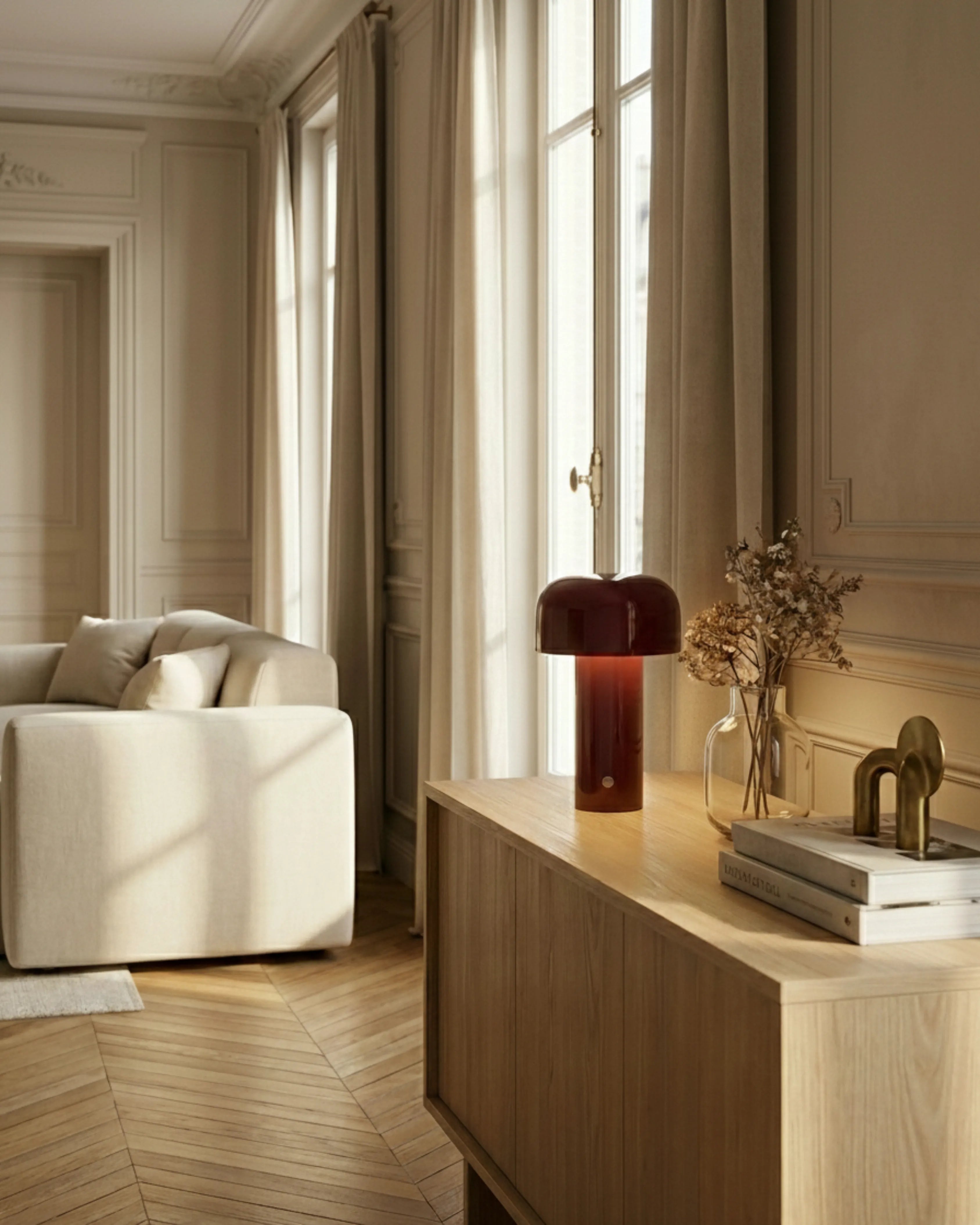 LAKO cordless designer table lamp in a warm, considered living room setting — DecoHarmonie