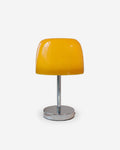 RANGU designer table lamp with glossy amber glass mushroom shade on polished chrome stem and base | DecoHarmonie