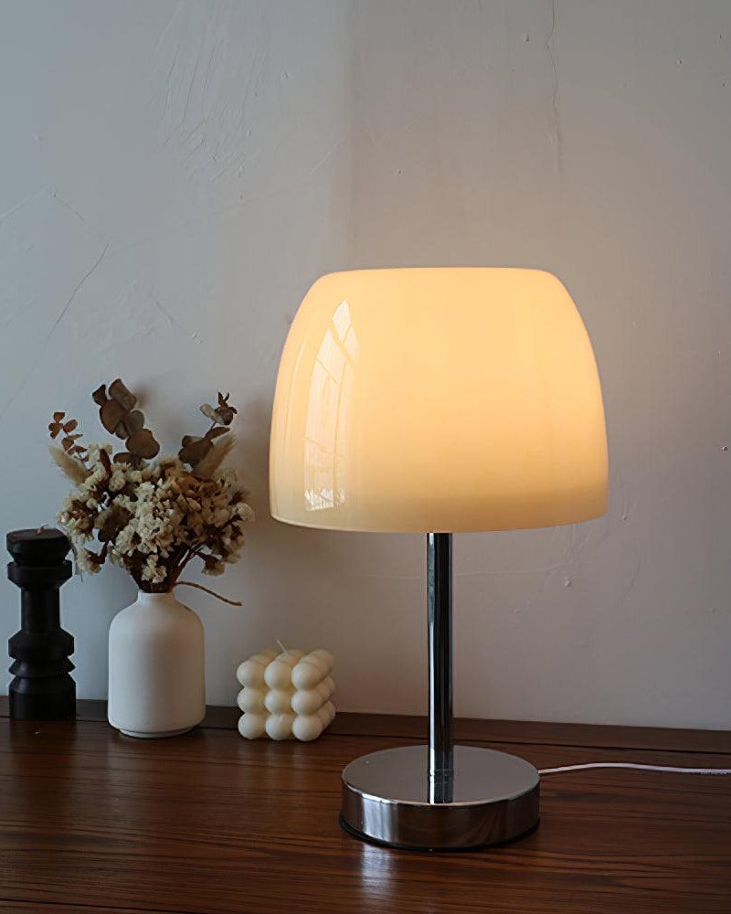 RANGU designer table lamp shown on a bedside table in a modern bedroom — DecoHarmonie