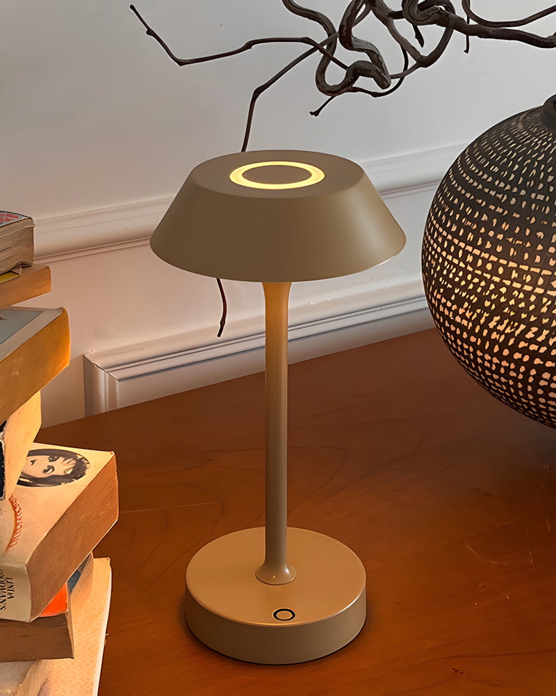 RUVA designer table lamp in a warm, considered living room setting — DecoHarmonie