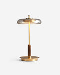 TOCRIS table lamp with smoked amber glass disc shade, brushed brass stem and walnut wood detail, designer | DecoHarmonie