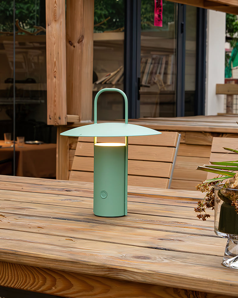 ORKA designer table lamp shown on a bedside table in a modern bedroom — DecoHarmonie