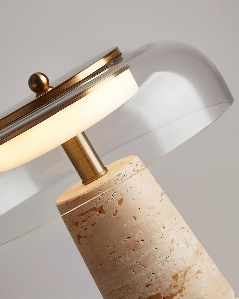 ZOA designer table lamp casting warm ambient light over a coffee table — DecoHarmonie
