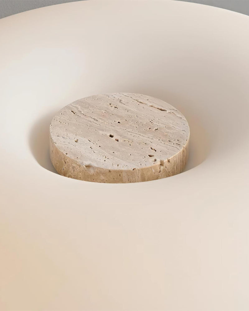 ZENO designer table lamp casting warm ambient light over a coffee table — DecoHarmonie