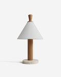 TEA table lamp with white linen conical shade, fluted oak wood stem and round travertine base, designer | DecoHarmonie