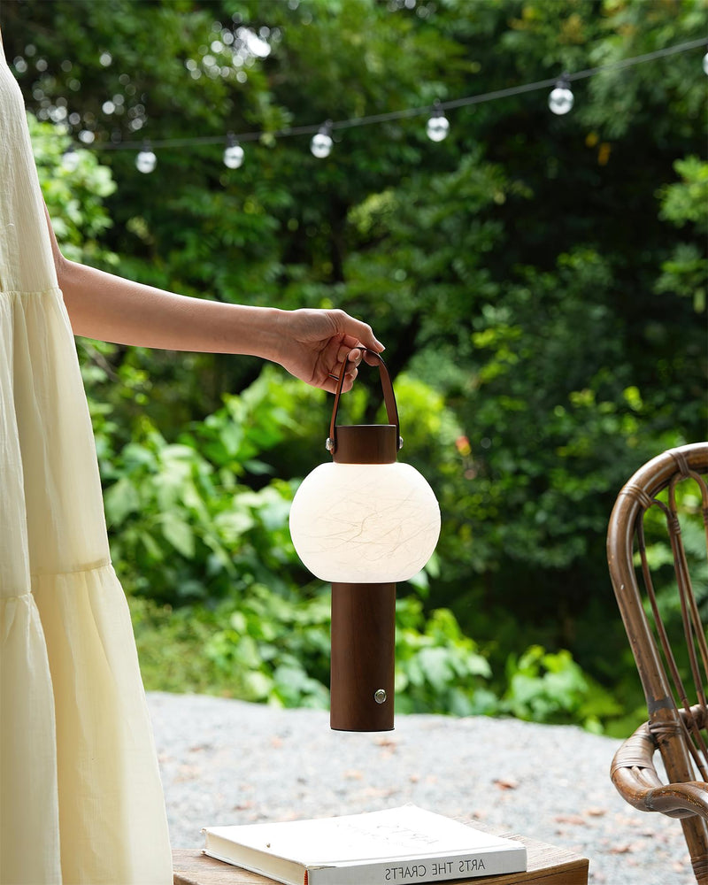 VENA designer table lamp shown on a bedside table in a modern bedroom — DecoHarmonie