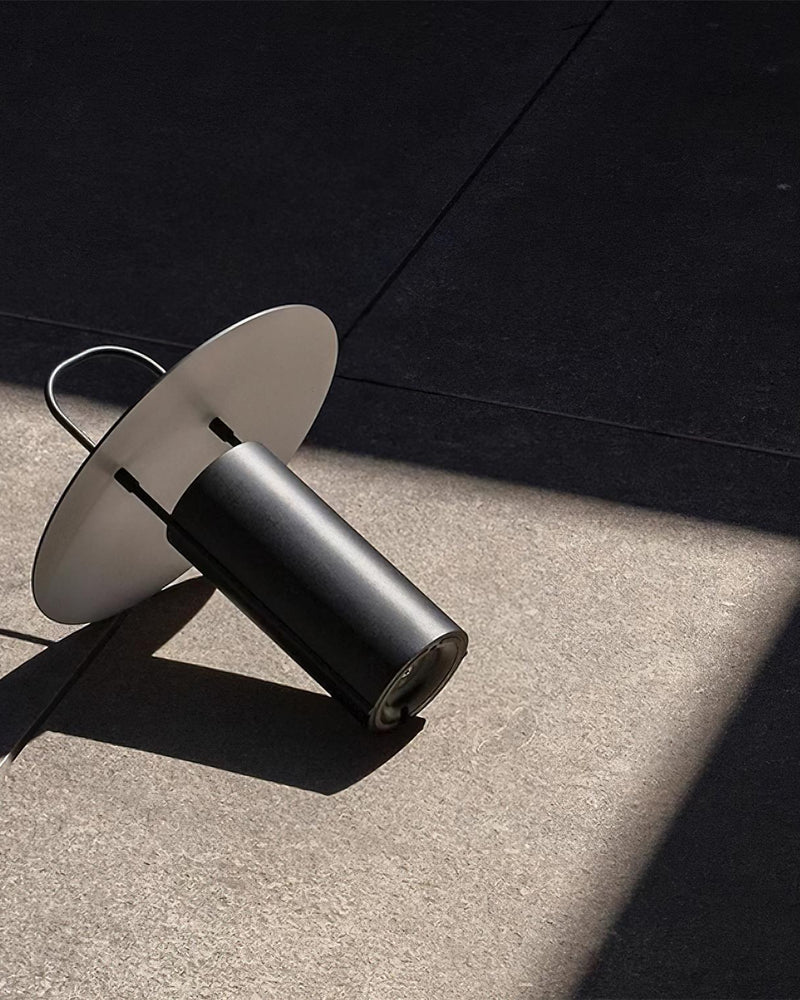 ORKA designer table lamp highlighting its sculptural silhouette in profile — DecoHarmonie