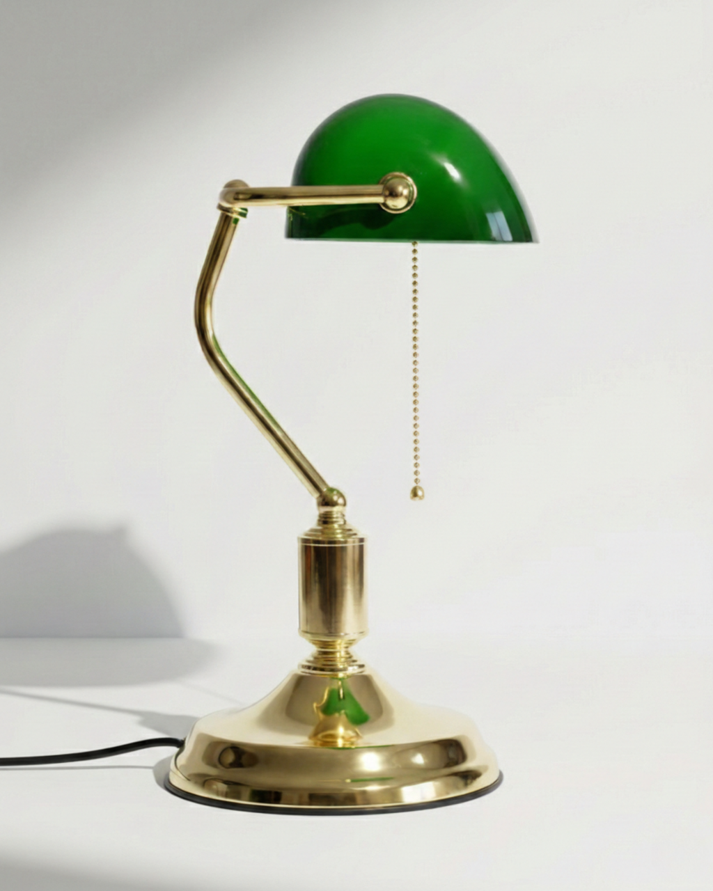 ANTIK banker's designer desk lamp highlighting its sculptural silhouette in profile — DecoHarmonie
