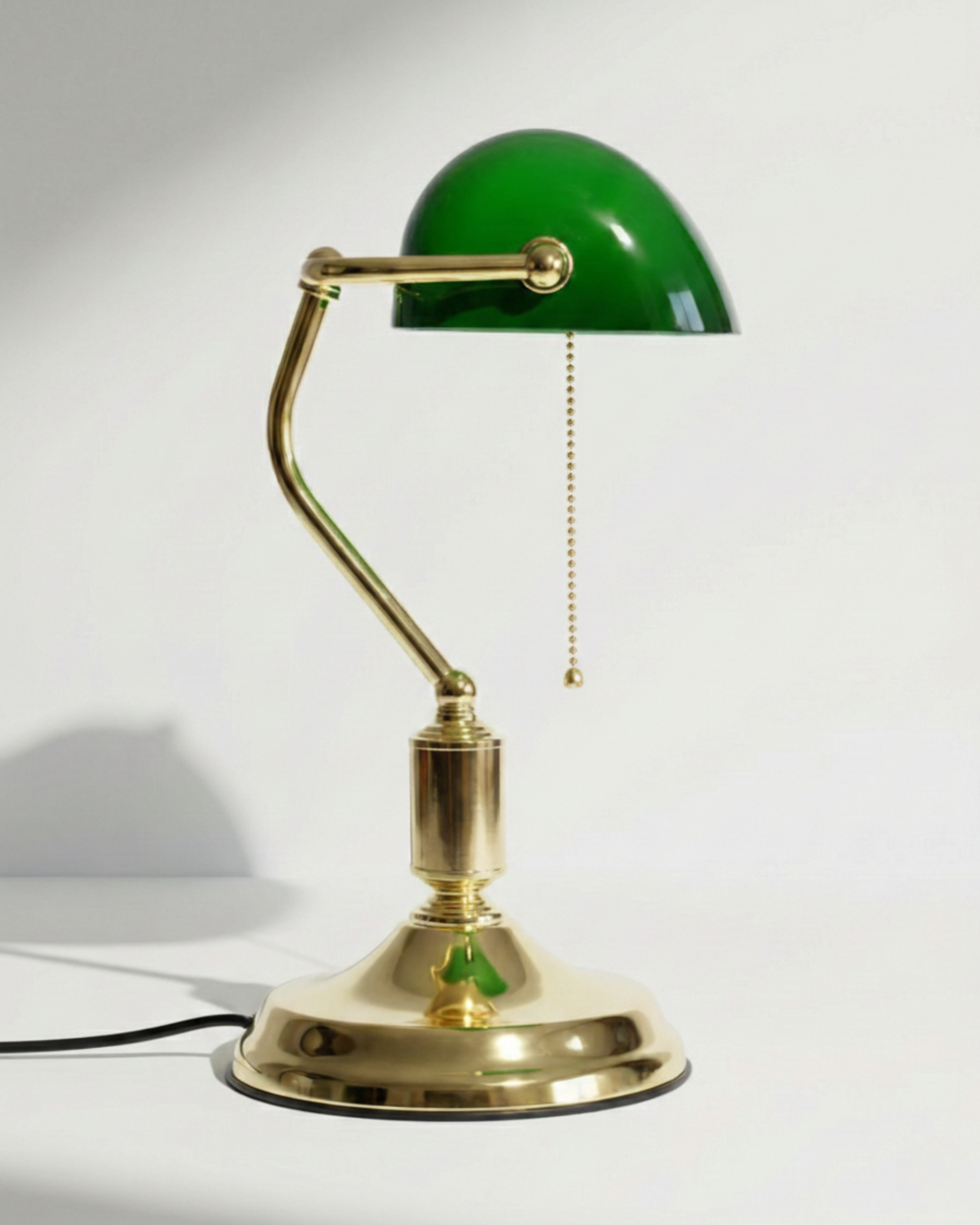 ANTIK banker's designer desk lamp highlighting its sculptural silhouette in profile — DecoHarmonie