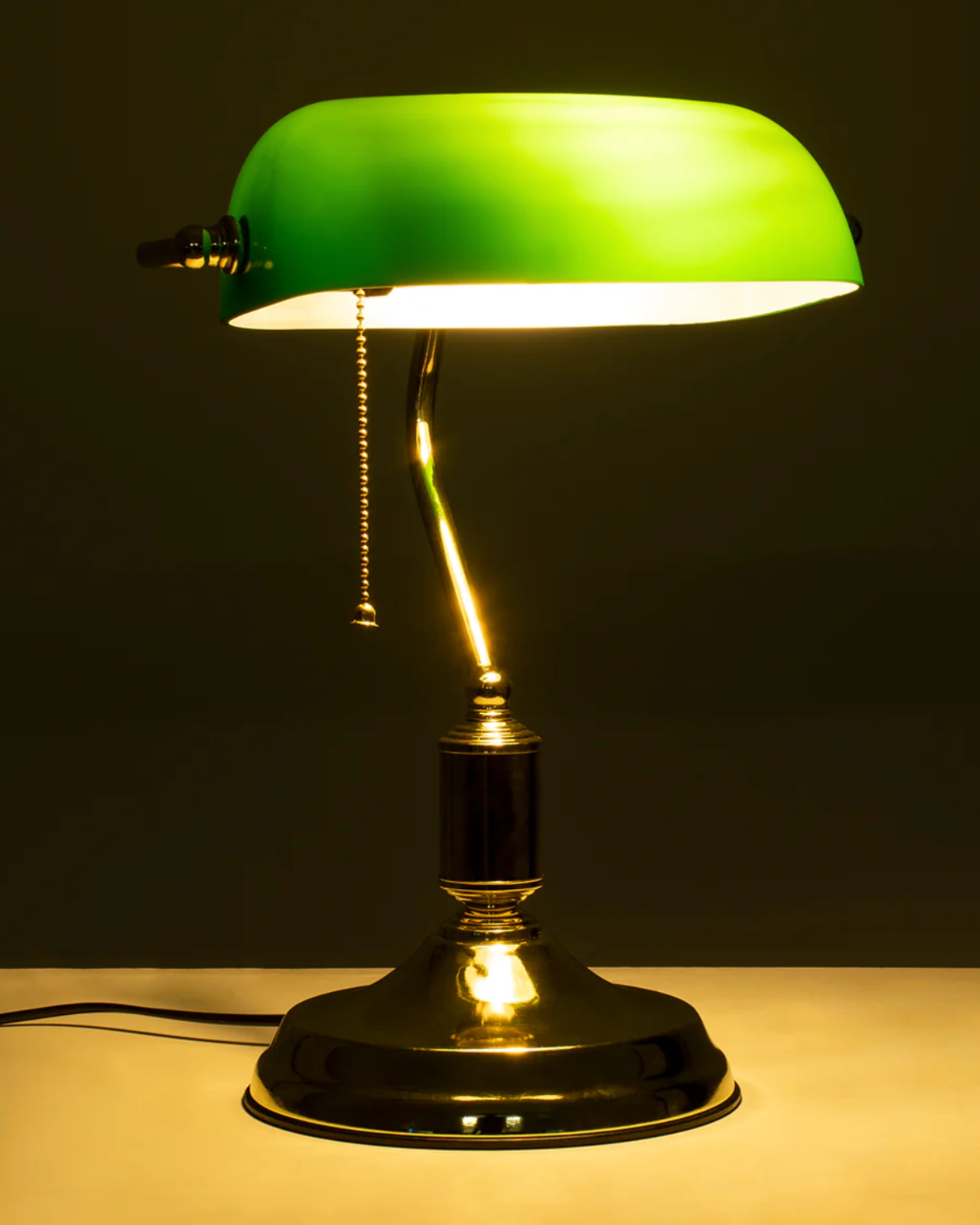 ANTIK banker's designer desk lamp set against a neutral wabi-sabi backdrop — DecoHarmonie