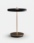 SKEN cordless table lamp with matte black flat disc shade, brass stem and round bronze base | DecoHarmonie