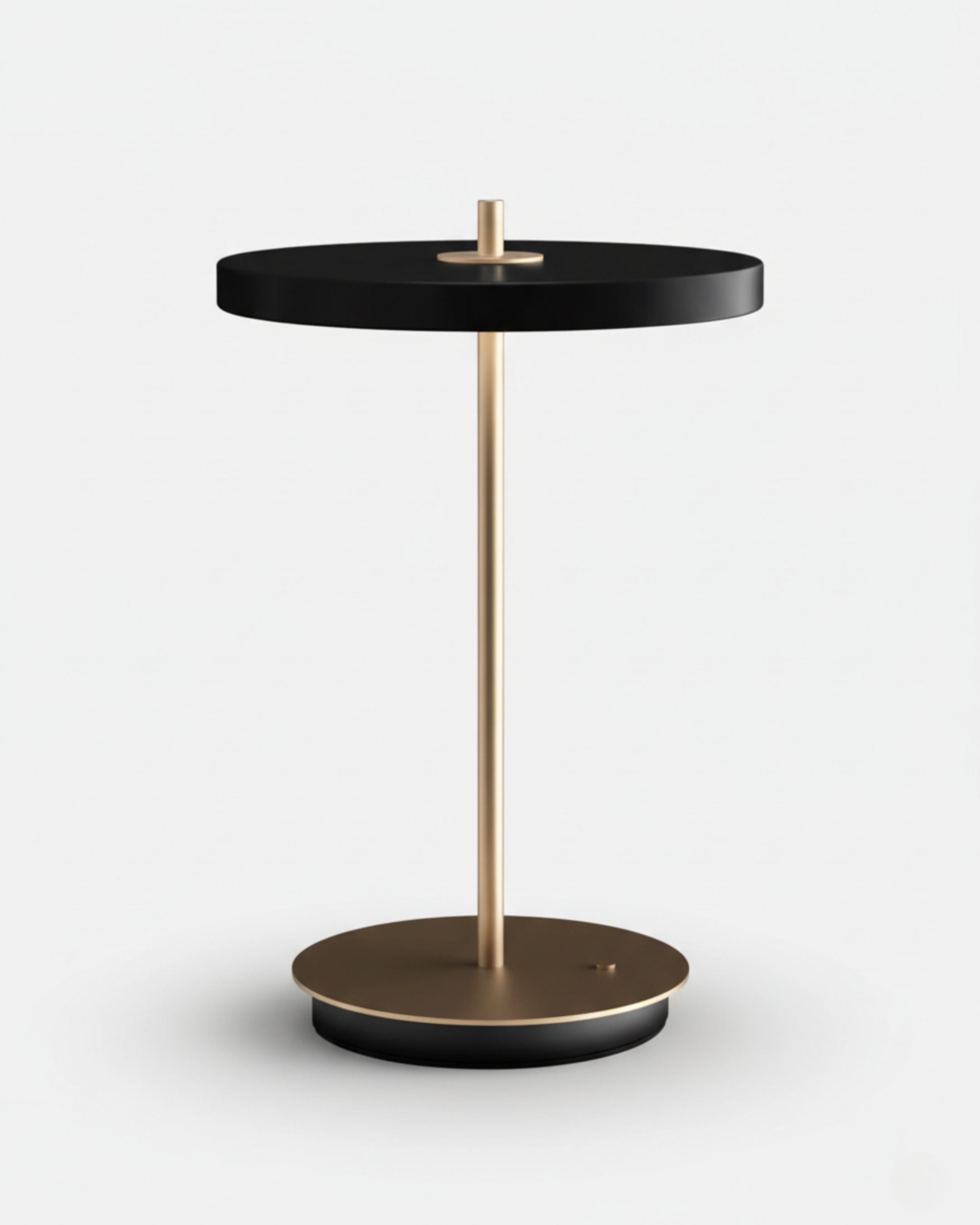 SKEN cordless table lamp with matte black flat disc shade, brass stem and round bronze base | DecoHarmonie
