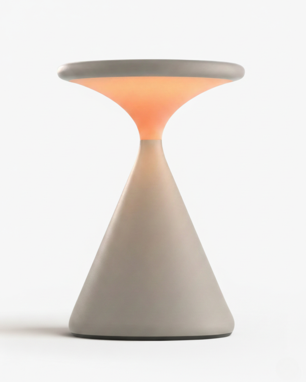 KONI cordless table lamp, sculptural hourglass cone in matte stone-grey resin with warm glow | DecoHarmonie