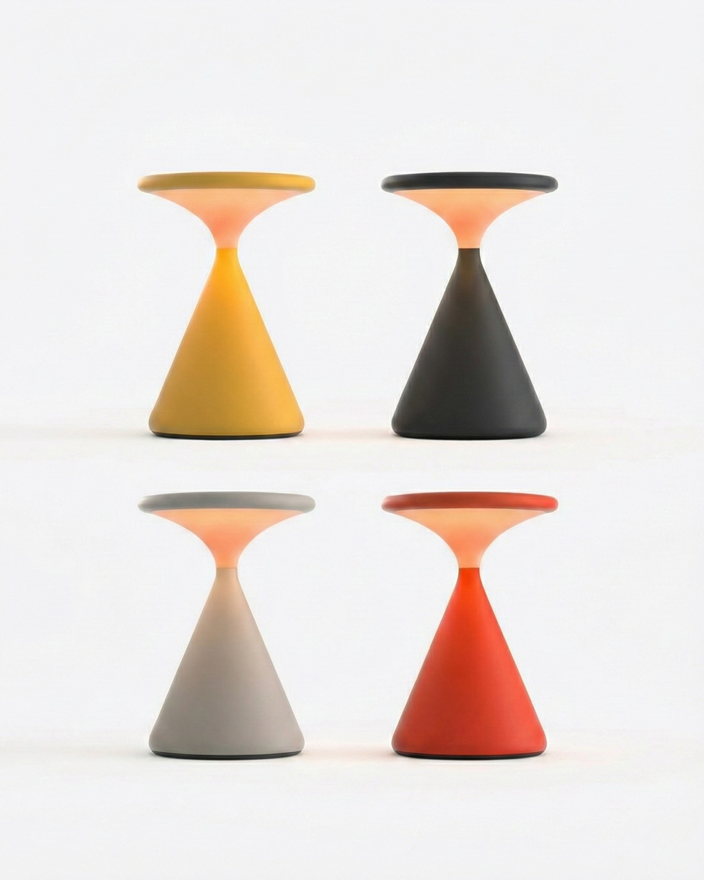 KONI cordless designer table lamp casting warm ambient light over a coffee table — DecoHarmonie