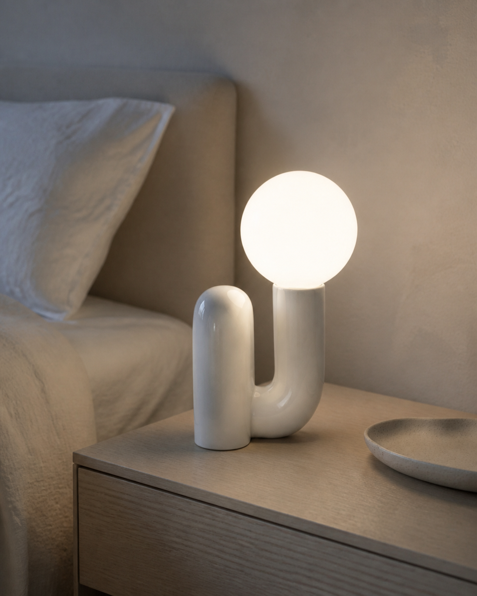 ARCA Designer Table Lamp — Postmodern Resin Base, Glass Globe — White, lifestyle view, bedroom | DecoHarmonie