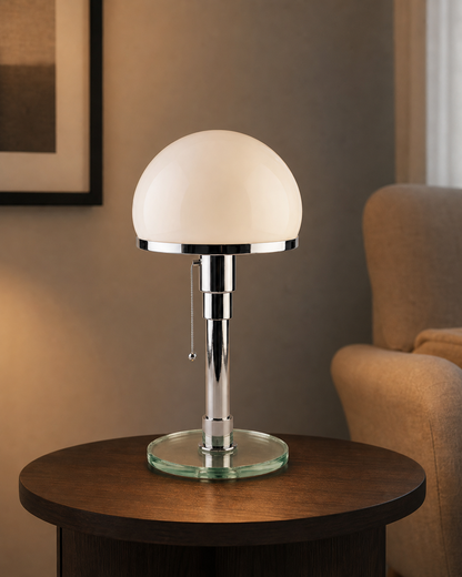 DOLIA Bauhaus Table Lamp — Opal Glass Globe, Chrome Base — Chrome, lifestyle view, reading corner | DecoHarmonie