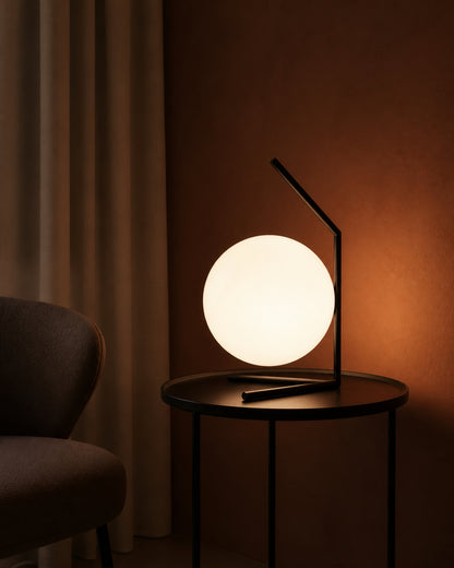 ENNA Designer Table Lamp — Angular Frame, Opal Glass Globe — Black, evening lifestyle | DecoHarmonie