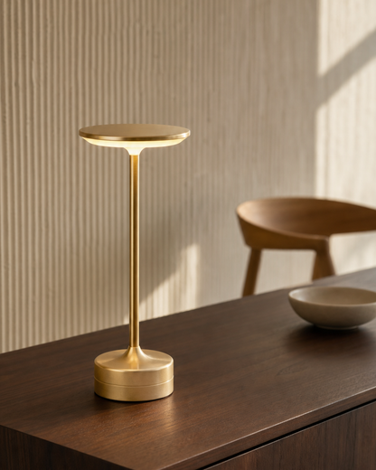 LORA Cordless Table Lamp — Metal Disc, 3-Level Touch Dimmer — Gold, lifestyle view, walnut dining room | DecoHarmonie