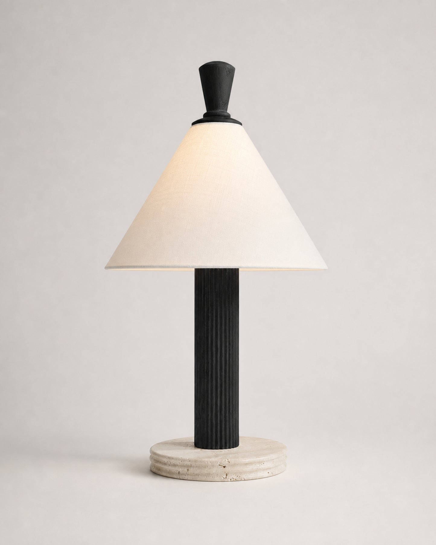 TÉA Table Lamp — Fluted Wood, Travertine Base & Linen Shade — Black, studio packshot on grey background | DecoHarmonie