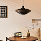Modern pendant light over a living room table
