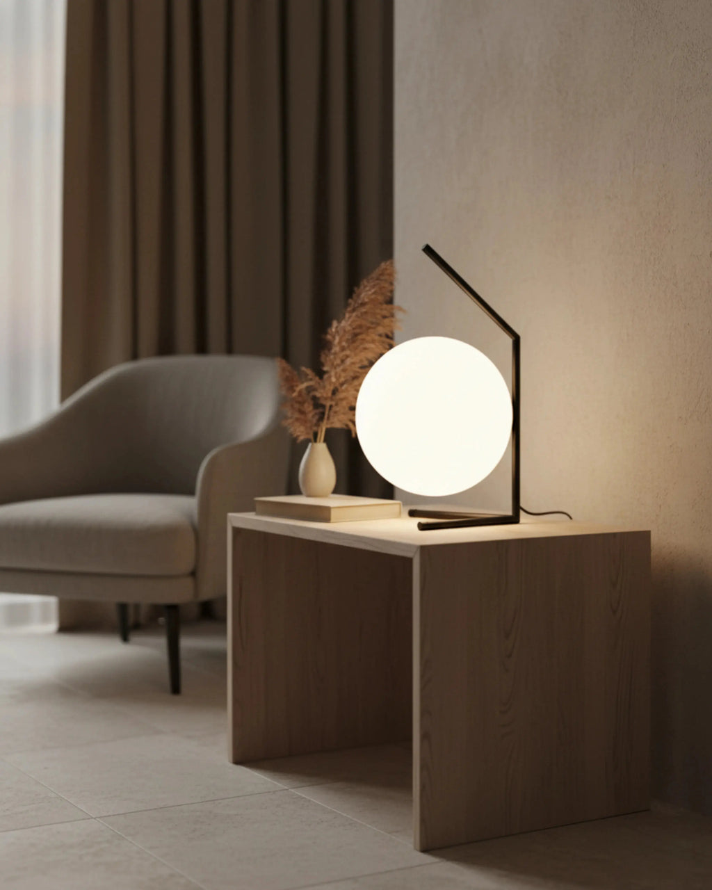 ENNA designer table lamp shown on a bedside table in a modern bedroom — DecoHarmonie