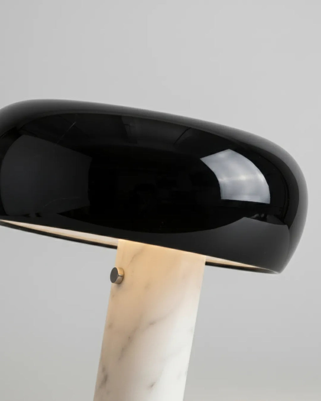 CAMOS designer table lamp softening the light in a contemporary lounge — DecoHarmonie