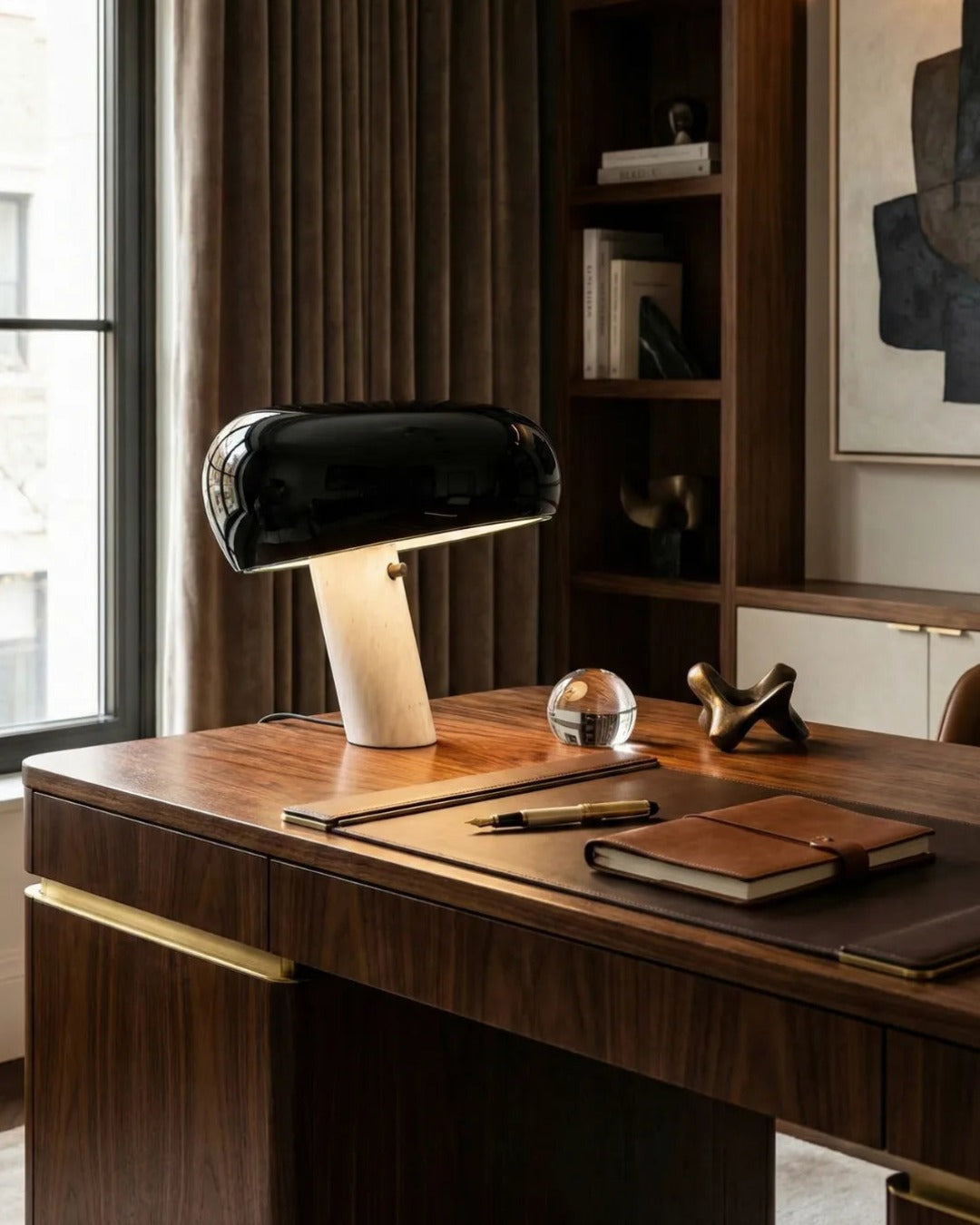 CAMOS designer table lamp shown on a bedside table in a modern bedroom — DecoHarmonie