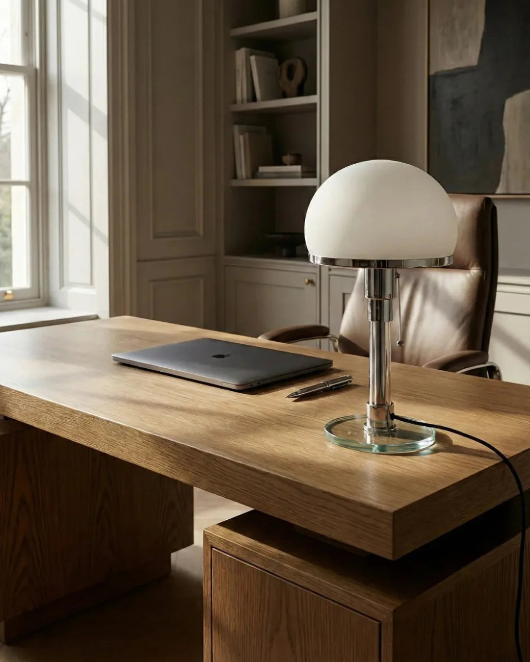 DOLIA designer table lamp shown on a bedside table in a modern bedroom — DecoHarmonie