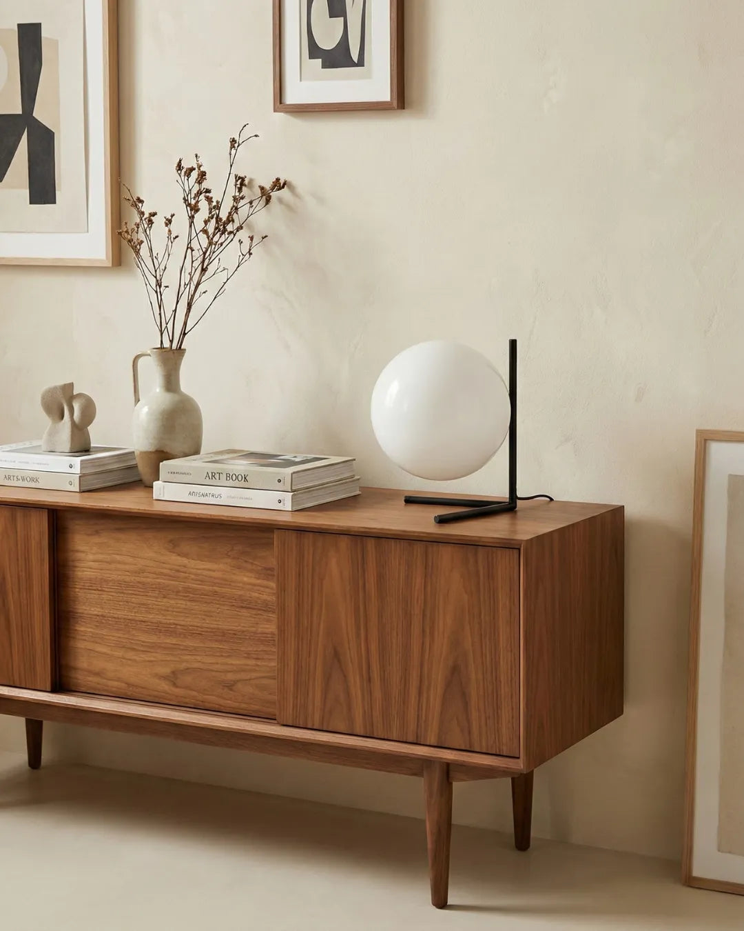 KAEN designer table lamp softening the light in a contemporary lounge — DecoHarmonie
