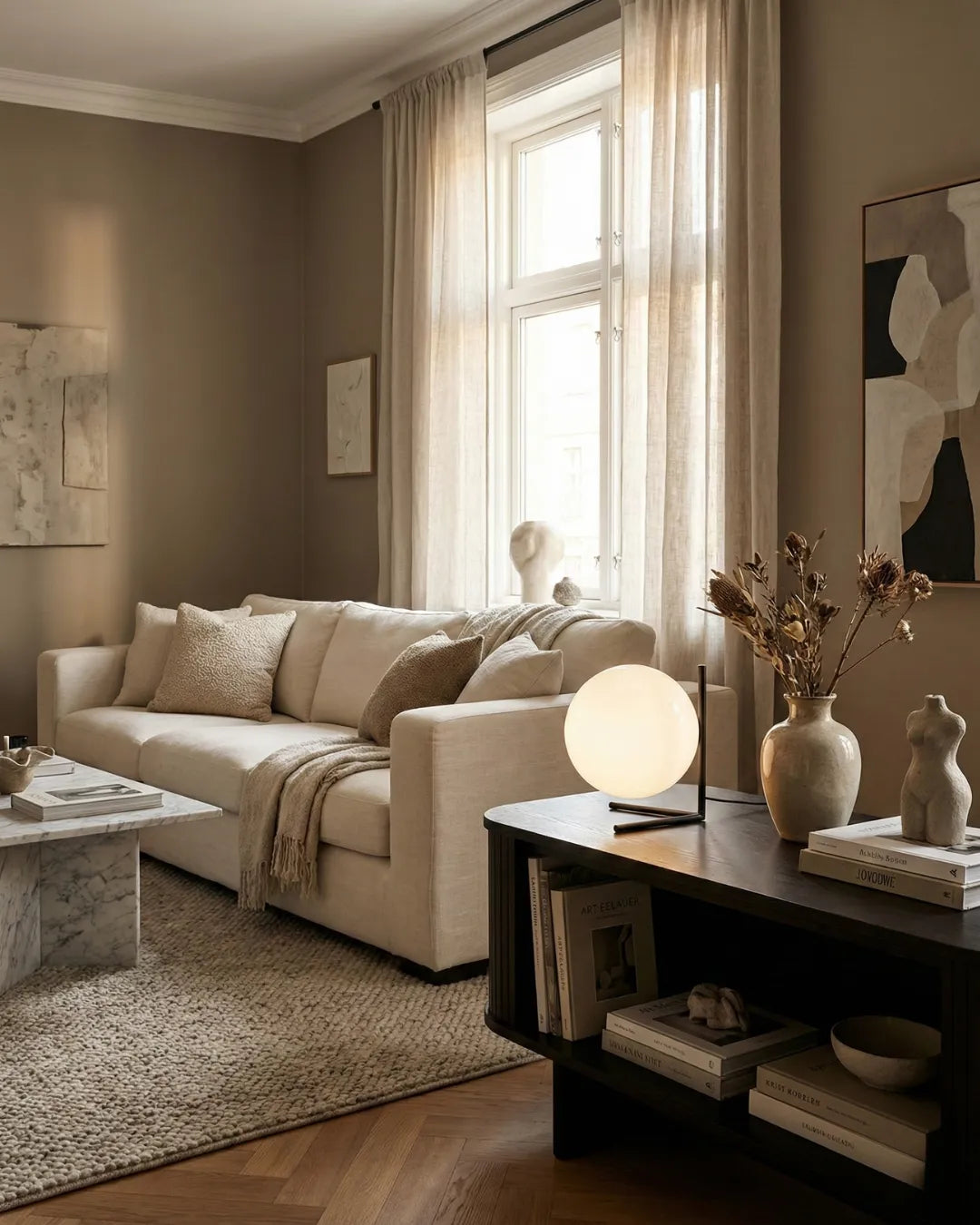 KAEN designer table lamp shown on a bedside table in a modern bedroom — DecoHarmonie