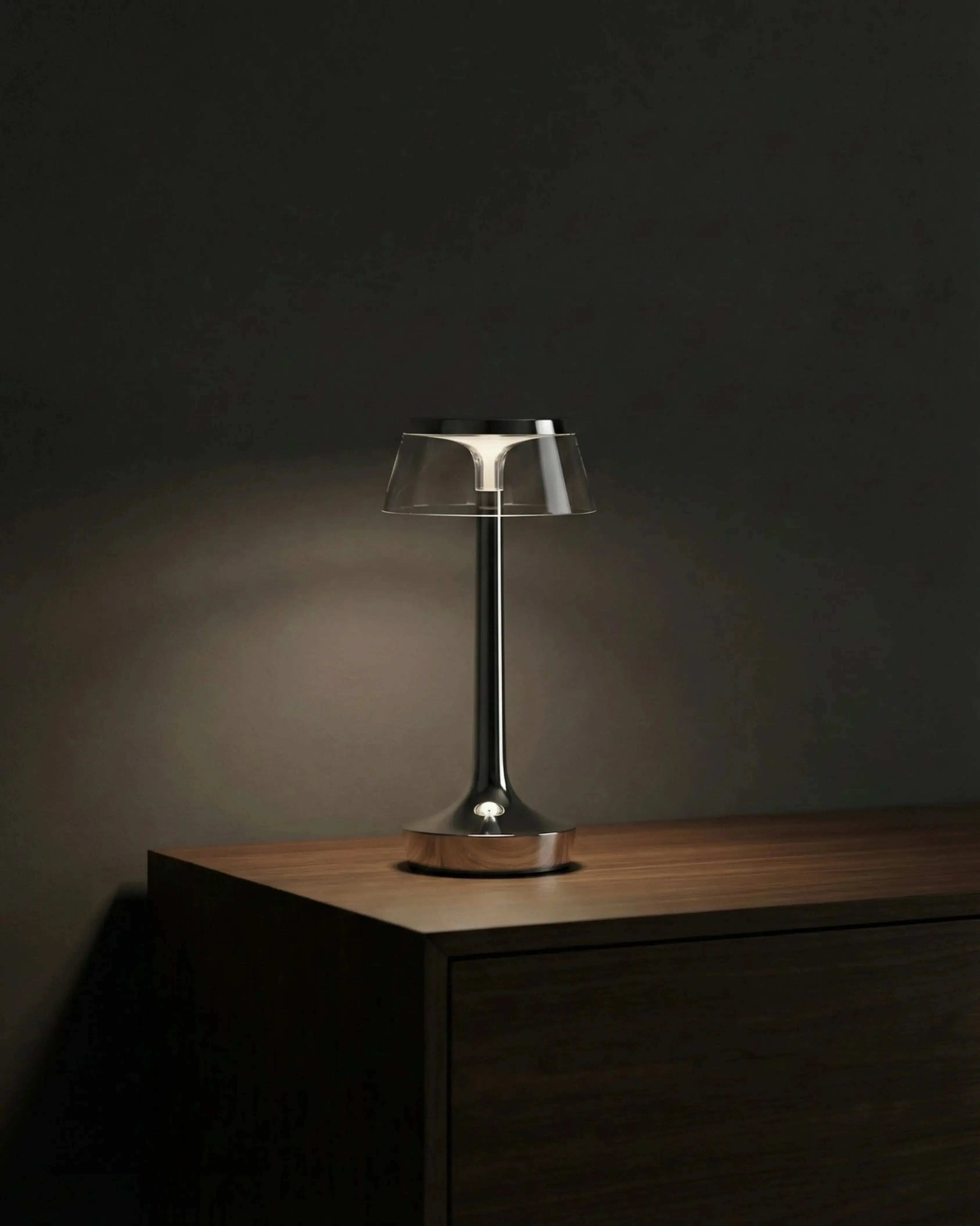 ORIN cordless designer table lamp shown on a bedside table in a modern bedroom — DecoHarmonie
