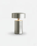 TOMI cordless table lamp, brushed silver cylindrical body and capstan disc shade, rechargeable designer lighting | DecoHarmonie