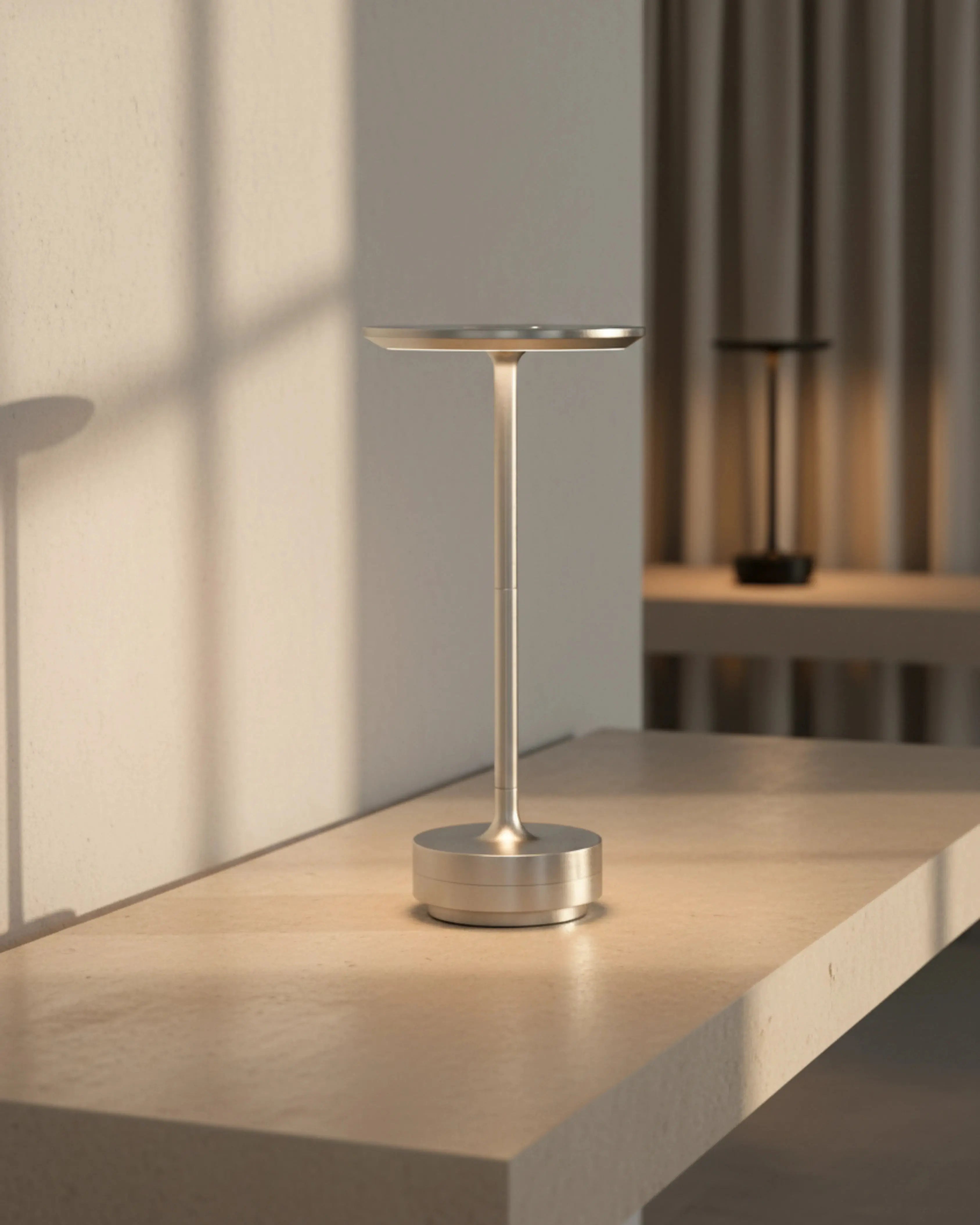LIRI cordless designer table lamp shown on a bedside table in a modern bedroom — DecoHarmonie
