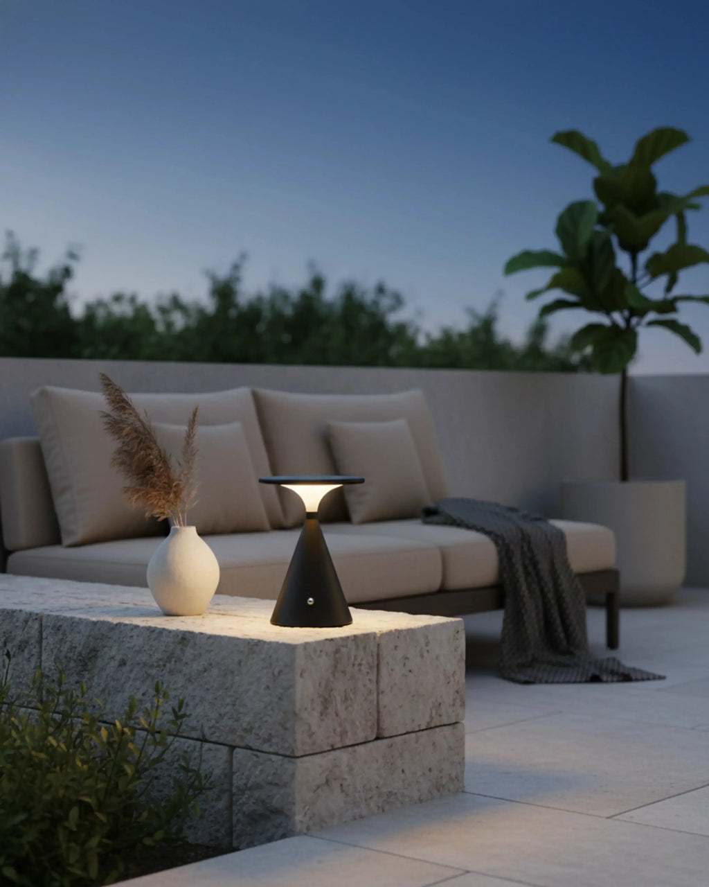 VEGA cordless designer table lamp shown on a bedside table in a modern bedroom — DecoHarmonie