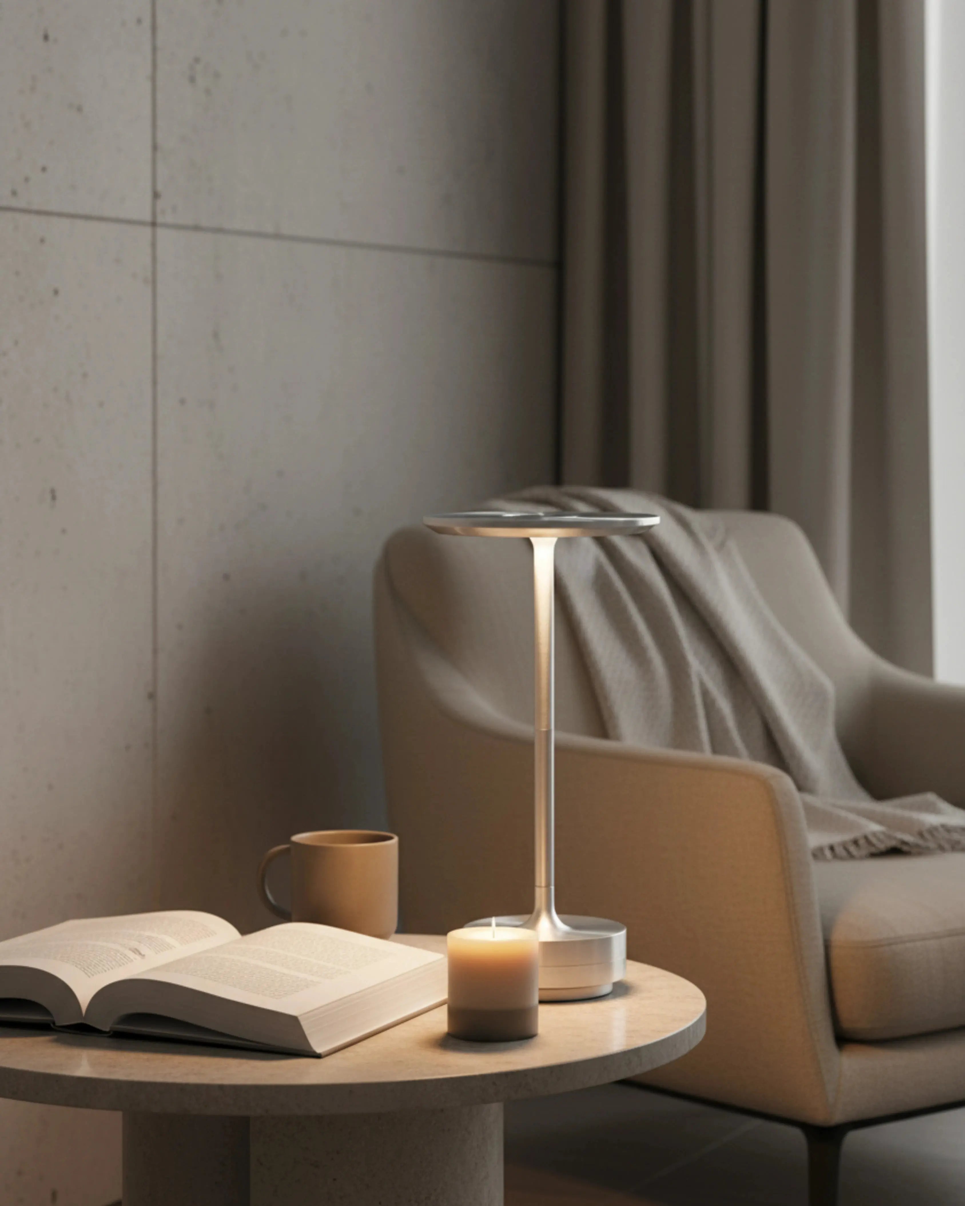 LIRI cordless designer table lamp casting warm ambient light over a coffee table — DecoHarmonie