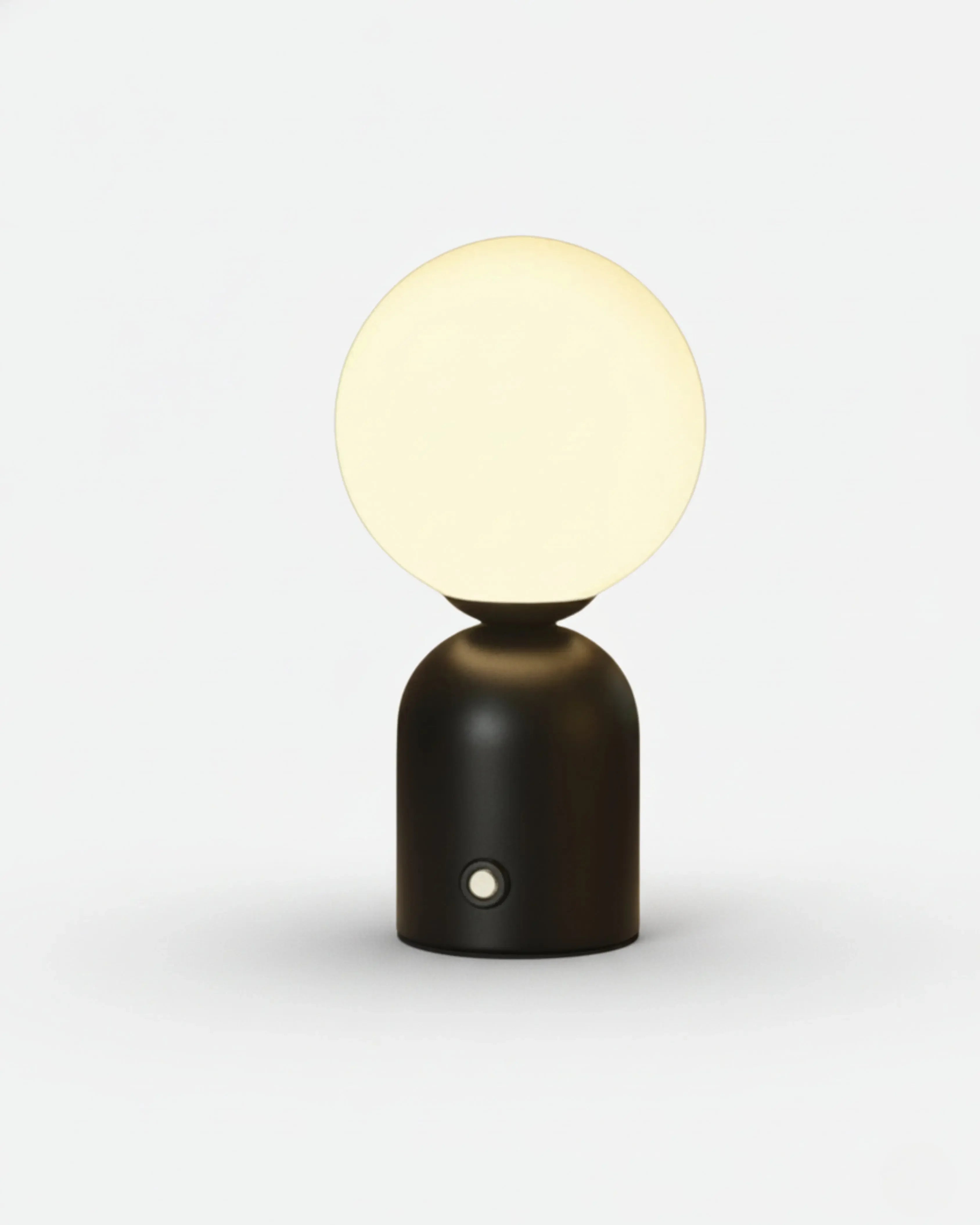 LUMI cordless table lamp with frosted glass globe shade on matte black metal base, rechargeable | DecoHarmonie