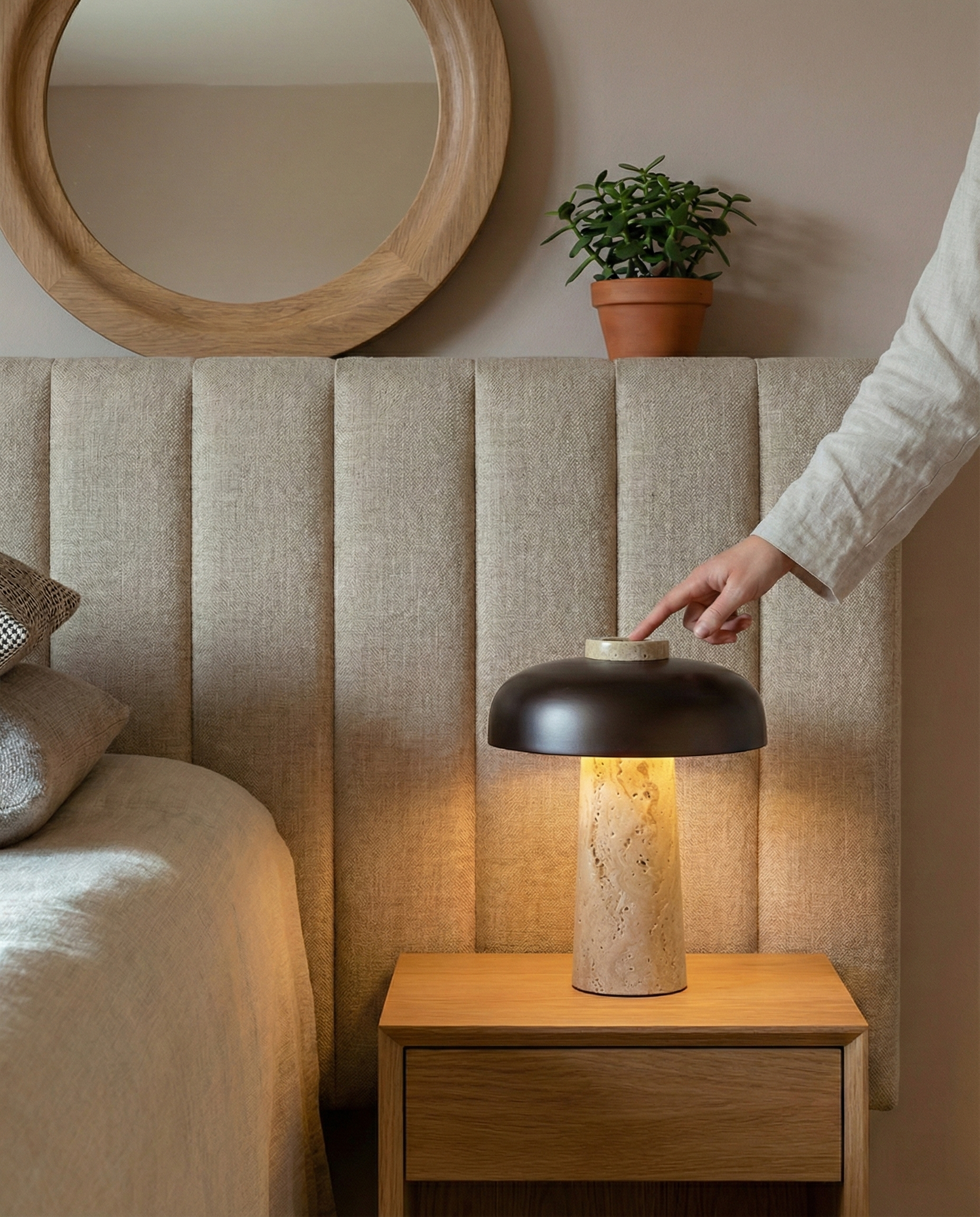 SAGAR designer table lamp shown on a bedside table in a modern bedroom — DecoHarmonie